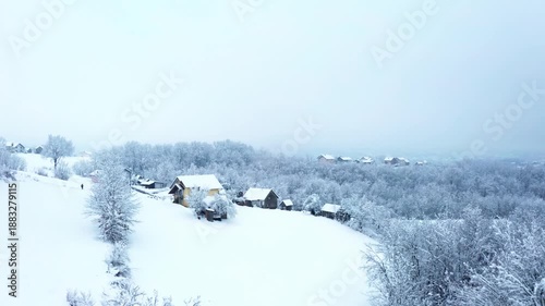 Snowy winter village landscape aerial view