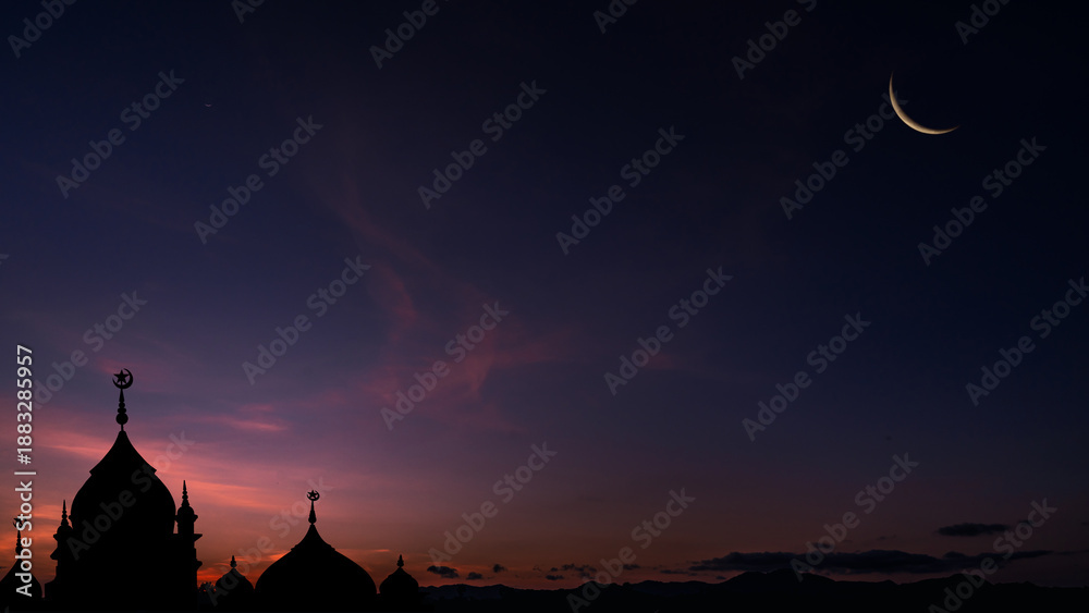 Fototapeta premium Crescent moon on twilight sky after sundown over dome Mosques, Religiuous Islam, Space for text Ramadan Kareem, Eid Mubarak, Eid al-Adha, Eid al-Fitr