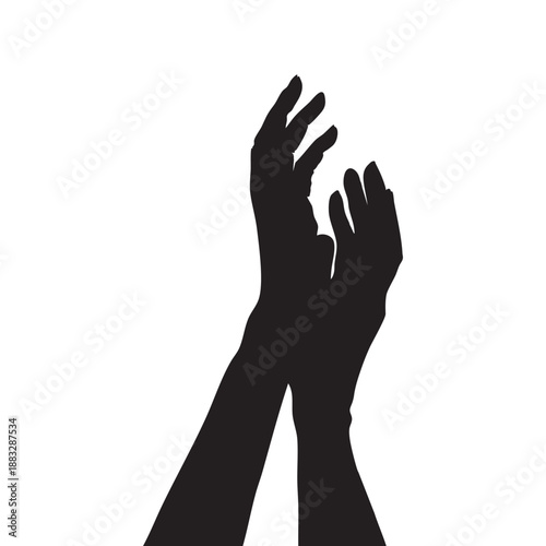 Silhouette of two hands raised upwards with fingers spread black white background