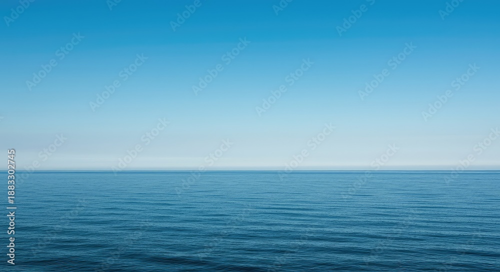 Obraz premium A vast, empty ocean horizon under a clear, endless sky, providing a sense of solitude, peace, and the raw power of nature ,peace ,wide ,wet