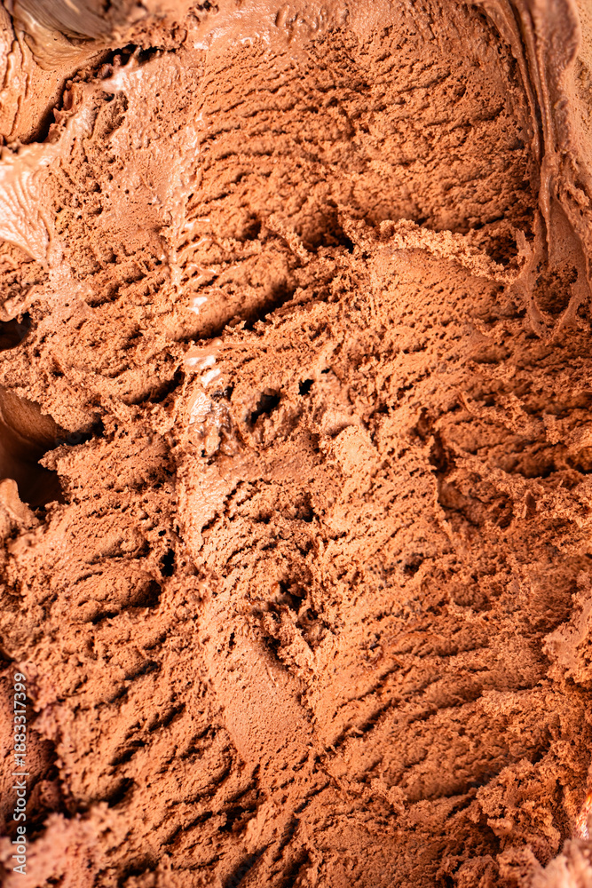 Obraz premium Scooped chocolate ice cream or chocolate ice cream background
