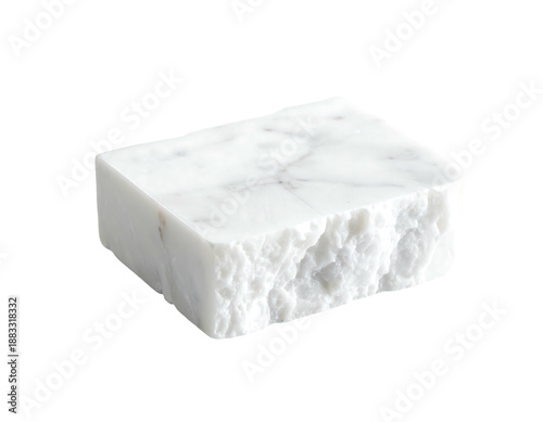 A white marble cube with a rough edge against a black background