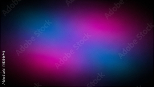 Vibrant colors blend in a dark abstract background from a close-up viewpoint