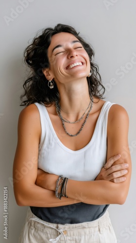 Authentic woman smiling with closed eyes, embracing self love and happiness, radiating positive emotion