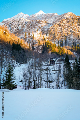 View of the mountain peaks around Alagna Valsesia, at the slopes of Rosa Massif, during wintertime. It has located in Piedmont Region (Northern Italy) and it's a rinomate ski resort.