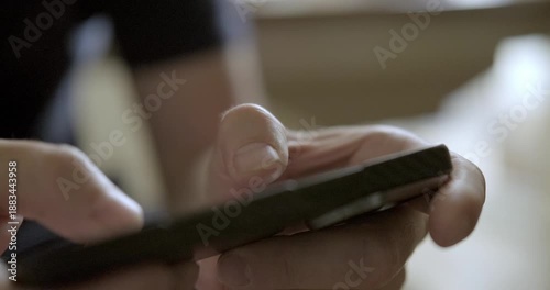 Man playing mobile phone close-up. High quality 4k footage