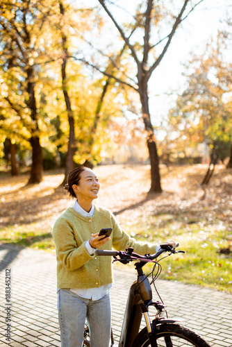 Korean woman enjoys a sunny...