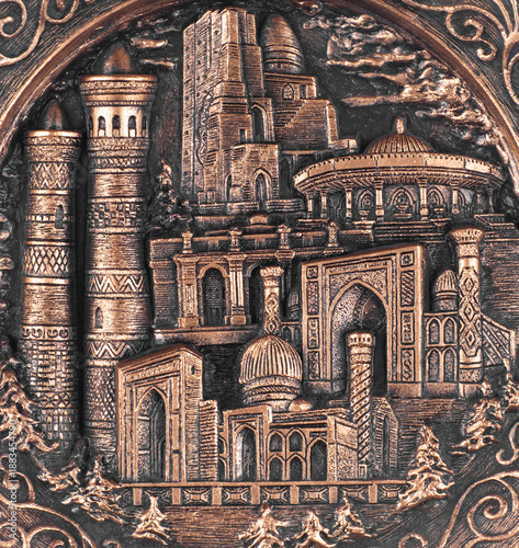 Engraving of an ancient city on a clay dish isolated on white background