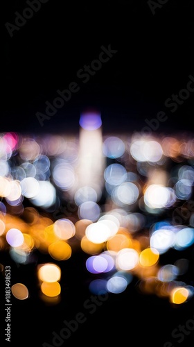 downtown. Abstract urban skyline at night, featuring blurred city lights and ...
