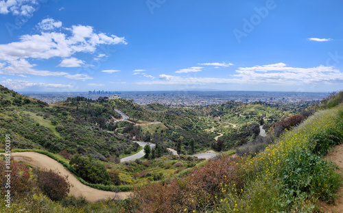 Bilde på lerret Panoramic scenic view of LA downtown city skyline, Griffith Observatory and hiking trails on the hills