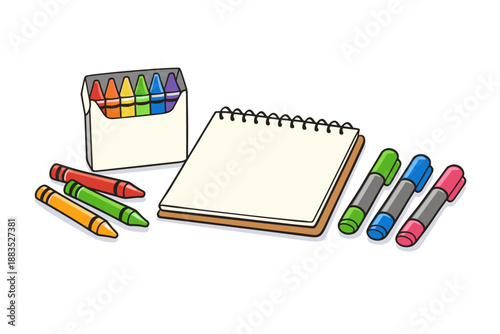 Colorful art supplies with notebook and crayons