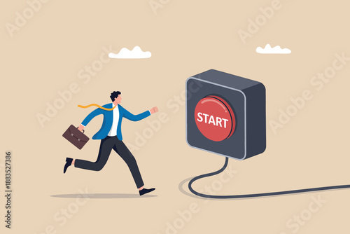 Businessman running to press the red start button, symbolizing new beginnings and business initiative