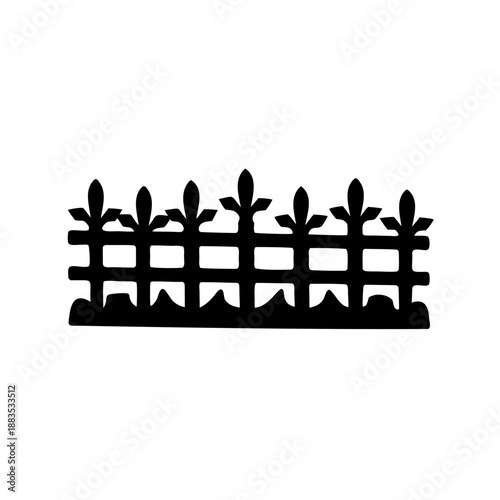 Silhouette image of an ornate picket fence with a fleurdelis design