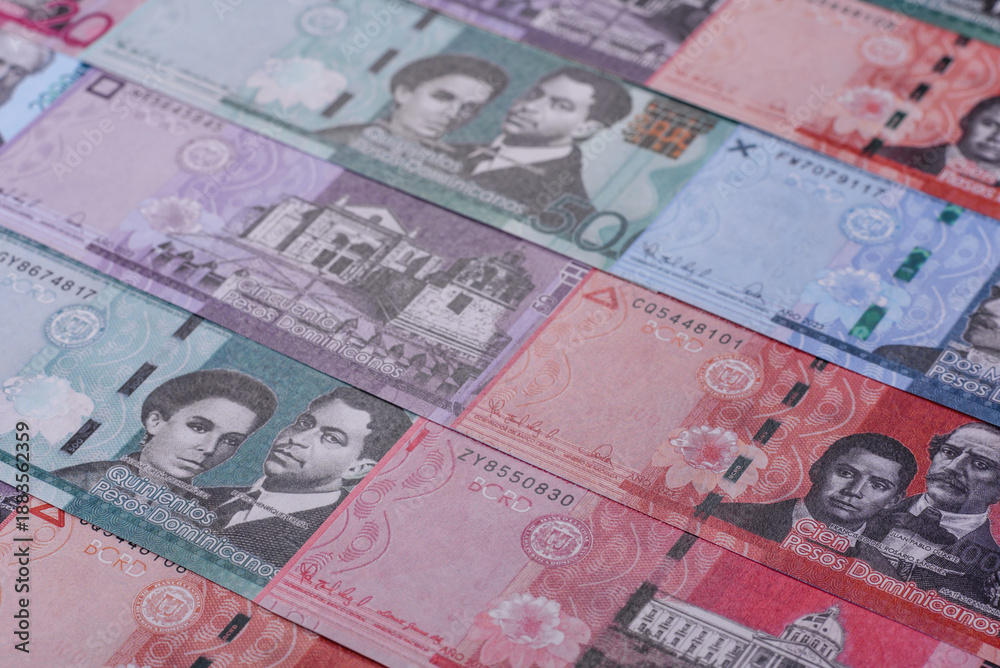 Obraz premium Dominican republic money, peso currency, banknotes of various denominations. Dominican money, peso