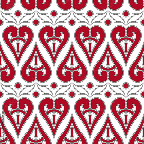 Red white seamless pattern of hearts. Red hearts on white background. Vintage lacy embroidery. Holiday romantic repeating ornament