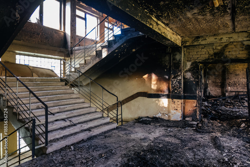 Obraz na plátně Burned interiors after fire or attack in industrial or office building