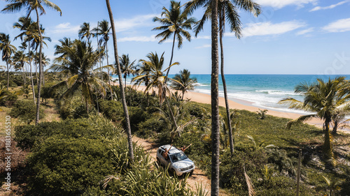 Canvas Print Panoramic aerial view of beaches and lagoon, with a car passing along the Bromel