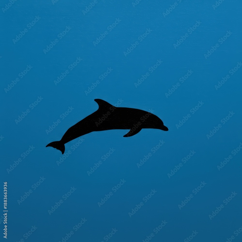 Fototapeta premium Dolphin Silhouette on Blue Background - Aquatic Mammal Image