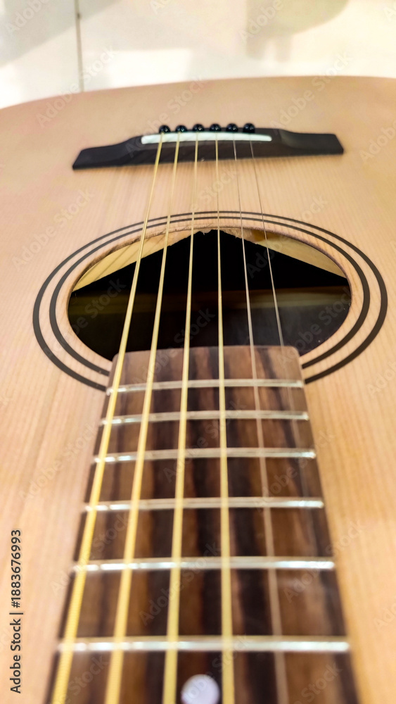 Fototapeta premium Guitar.Guitar chords.Acoustic guitar.Playing music with the guitar.