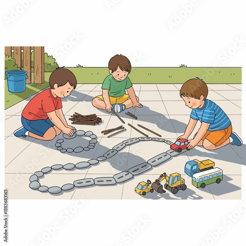 Boys building toy road with cars and construction vehicles outdoors