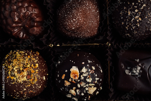 top down view of fancy chocolate truffles in box