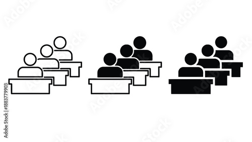 A group of people sitting at desks in a classroom setting with varying shades of gray