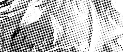 Aged halftone wrinkled foil overlay. Dotted crumpled metallic texture. Old rough creased bitmap background. Pixel creasy surface in comic pop art style. Grainy cartoon gritty paper wallpaper. Vector