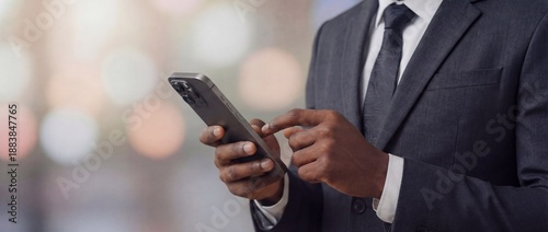 Serious Business Professional Using Modern Mobile Smart Phone Communication Device