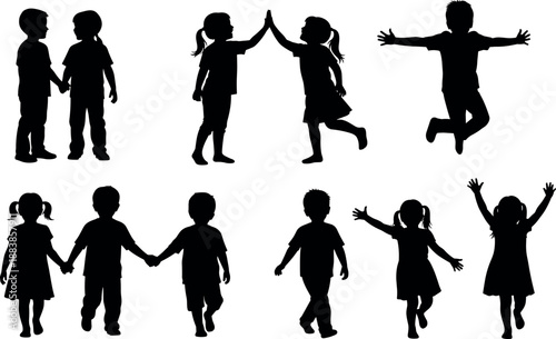 Black silhouettes of happy children playing jumping giving high five holding hands and walking together isolated on a white background