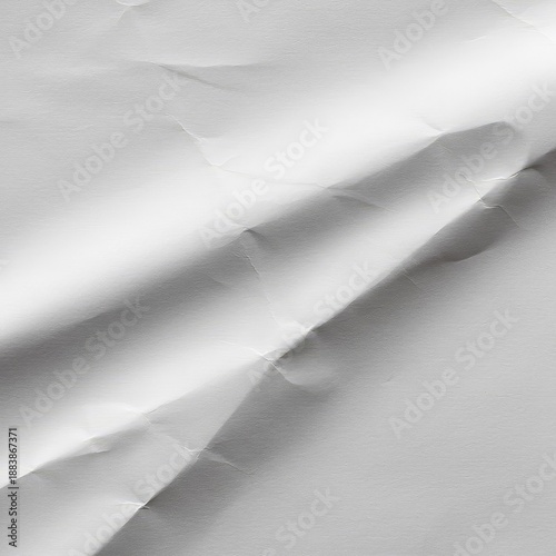 A close-up view of a highly textured white surface created by crumpled and folded paper, ideal for abstract backdrops and minimalist designs ,abstract ,simple ,rough