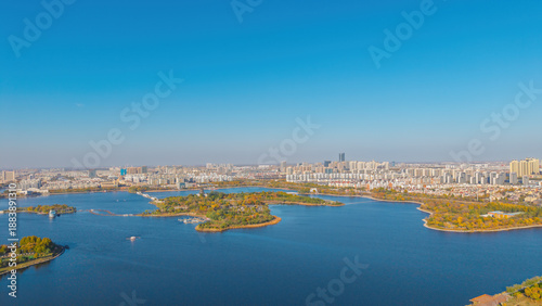 Aerial view of the urban architectural scenery and autumn landscape of Qingfeng Lake in Dongying, Shandong, China