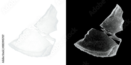 Foto Shattered glass fragments isolated on black and white backgrounds