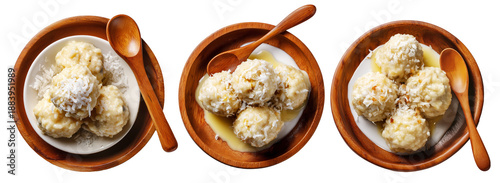 Banana rice dumplings topped with shredded coconut and sweet custard sauce in wooden bowl, isolated on white background