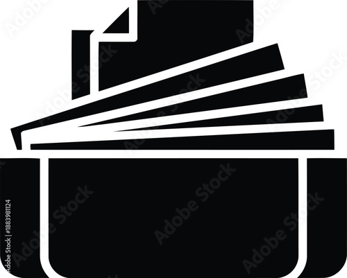 Printer with multiple sheets of paper in the output tray.