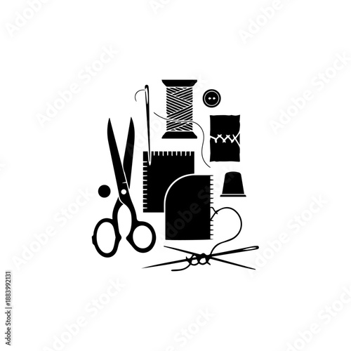 Sewing tools and notions arranged together on a clean surface viewed directly from above