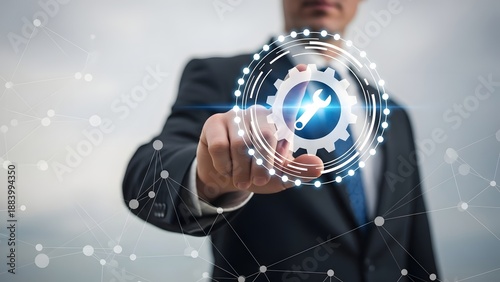 Businessman interacting with a digital globe and gear icon on a virtual screen.