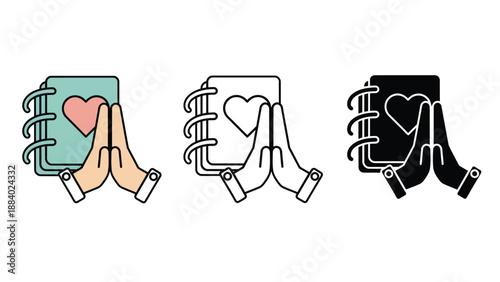 A hand holding a notebook with a heart on the cover in different colors