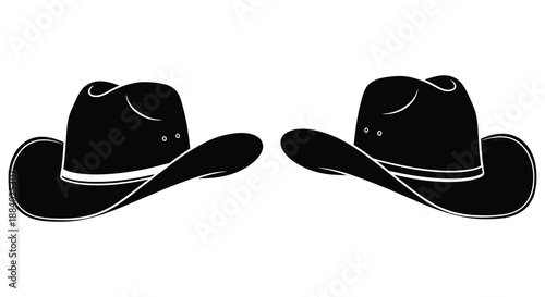 Two classic cowboy hats displayed against a plain background a striking silhouette