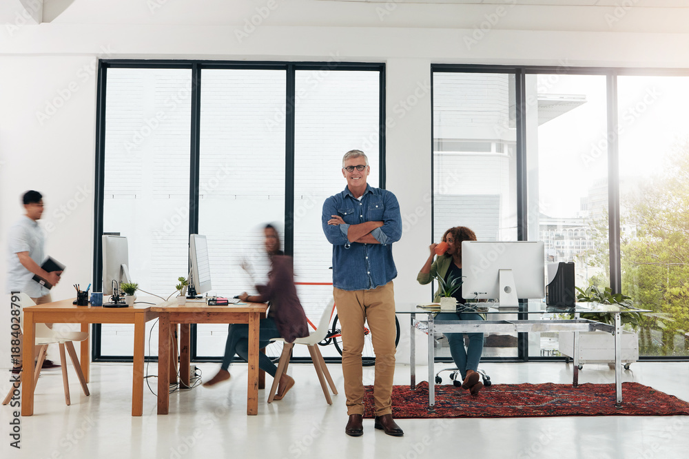 Fototapeta premium Portrait, arms crossed and man with smile in busy office, confident and entrepreneur of web design business. Professional, pride and manager of company in workplace, startup and agency development