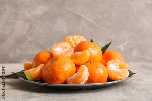 Fresh tangerines and peeled...