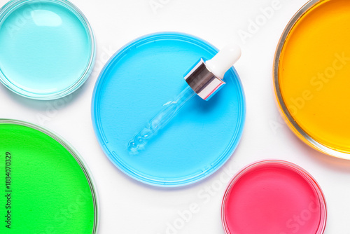 Wallpaper Mural Petri dishes with pipette and colorful liquids on white background Torontodigital.ca