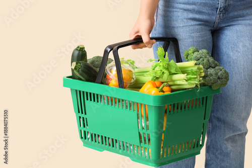 Green shopping basket with ...