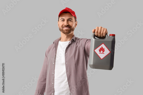 Young man with canister on ...