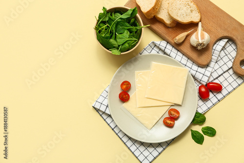 Flat lay of sliced cheese w...