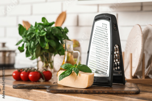 Grater, ingredients and woo...
