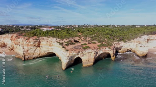 Drone flying over benagil cave in algarve portugal