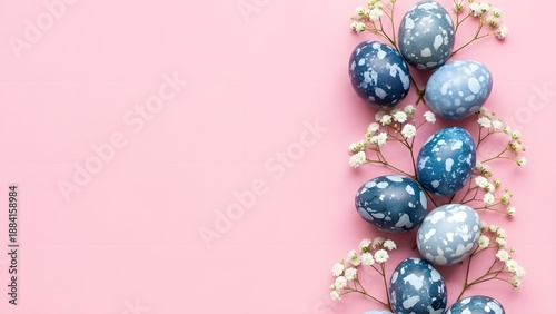 Modern Natural Dyed and Marbled Easter Eggs with Delicate Gypsophila Border on Pink Flat Lay with Copy Space