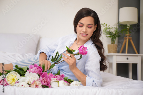 Beautiful young woman with ...