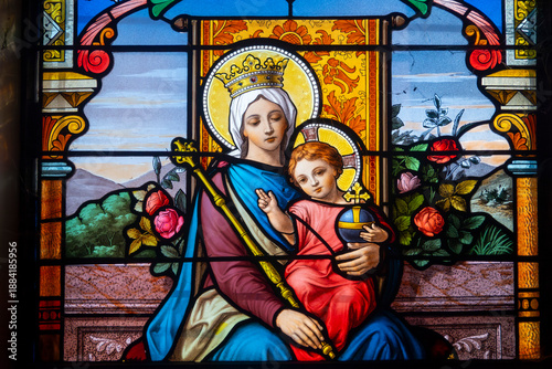 Bilde på lerret Stained glass (19th century) of Blessed Virgin Mary holding baby Jesus Christ in her arms