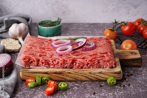 Wooden board of fresh mince...